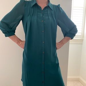 Dark green, button down, long sleeve dress.